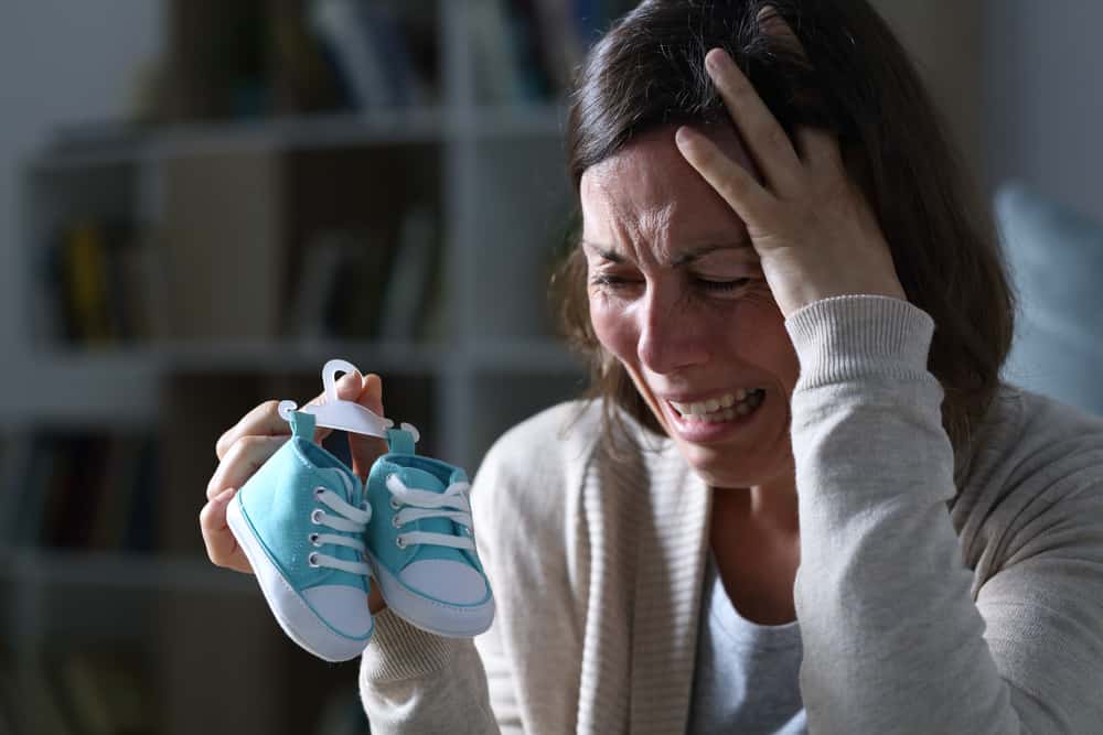 Carte de condoléances pour un bébé : Guide et modèle